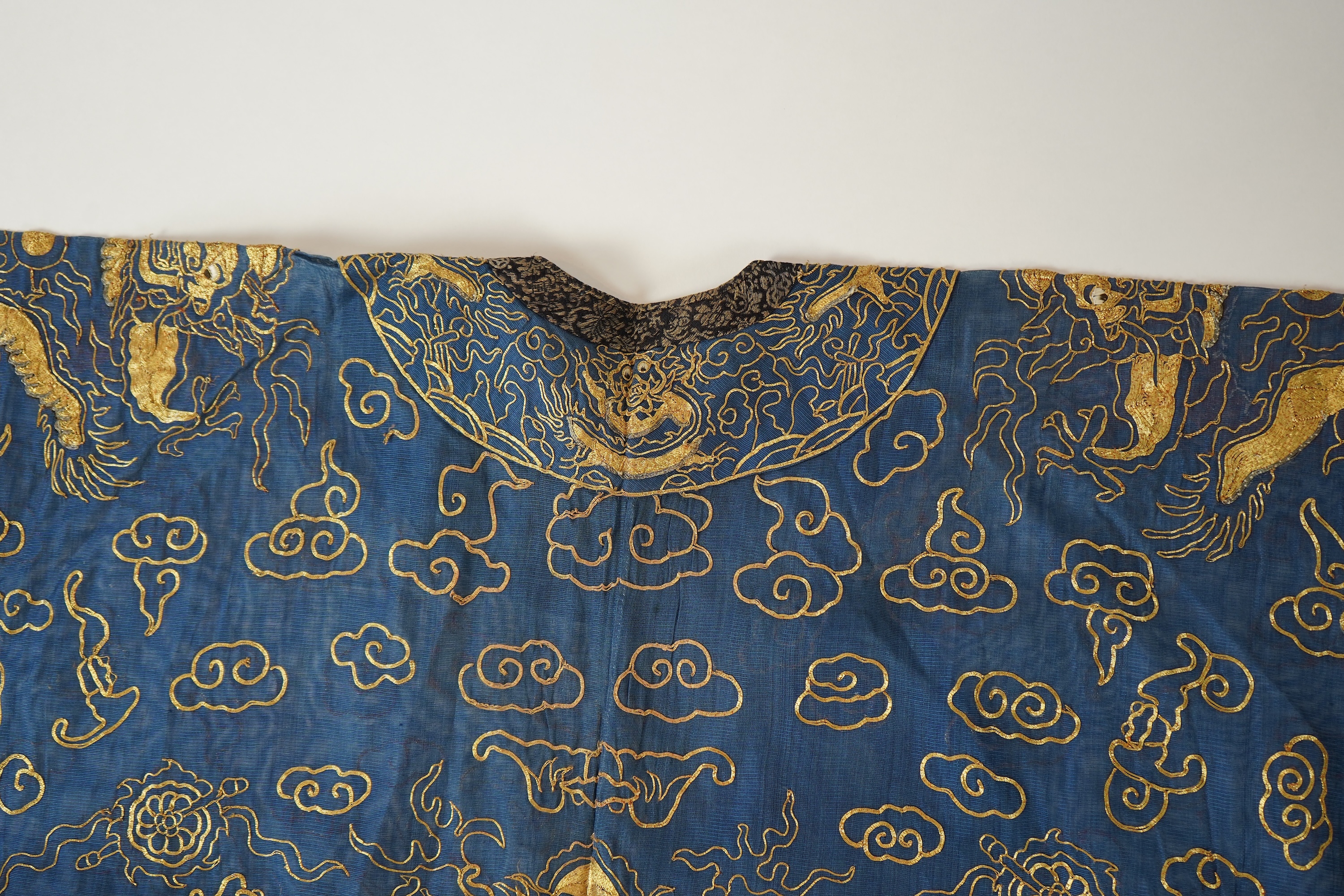 A Chinese gold thread and silk gauze ‘dragon’ summer robe, jifu, early 20th century